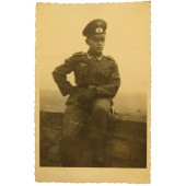 Wehrmacht Unteroffizier in full uniform and visor hat